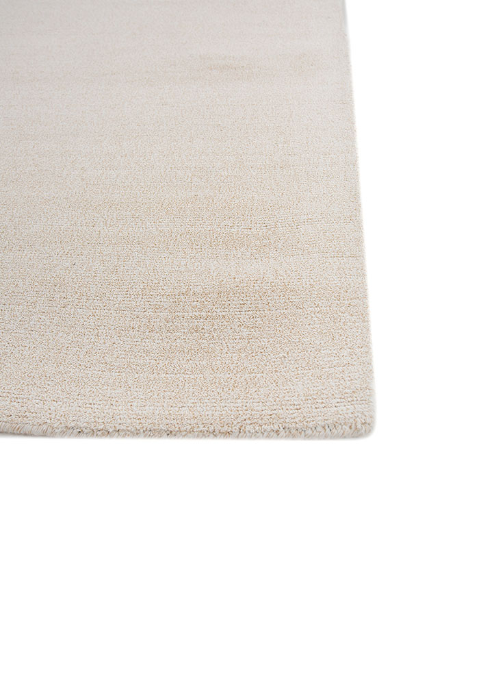 basis ivory acrylic hand loom Rug - Corner