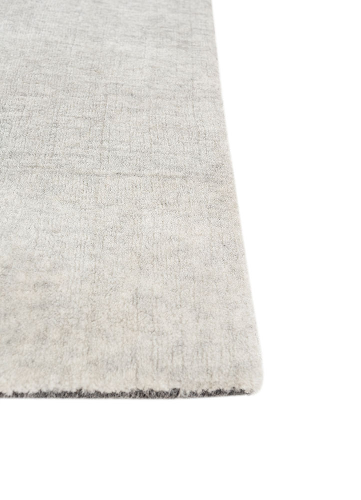jean grey and black wool hand loom Rug - Corner