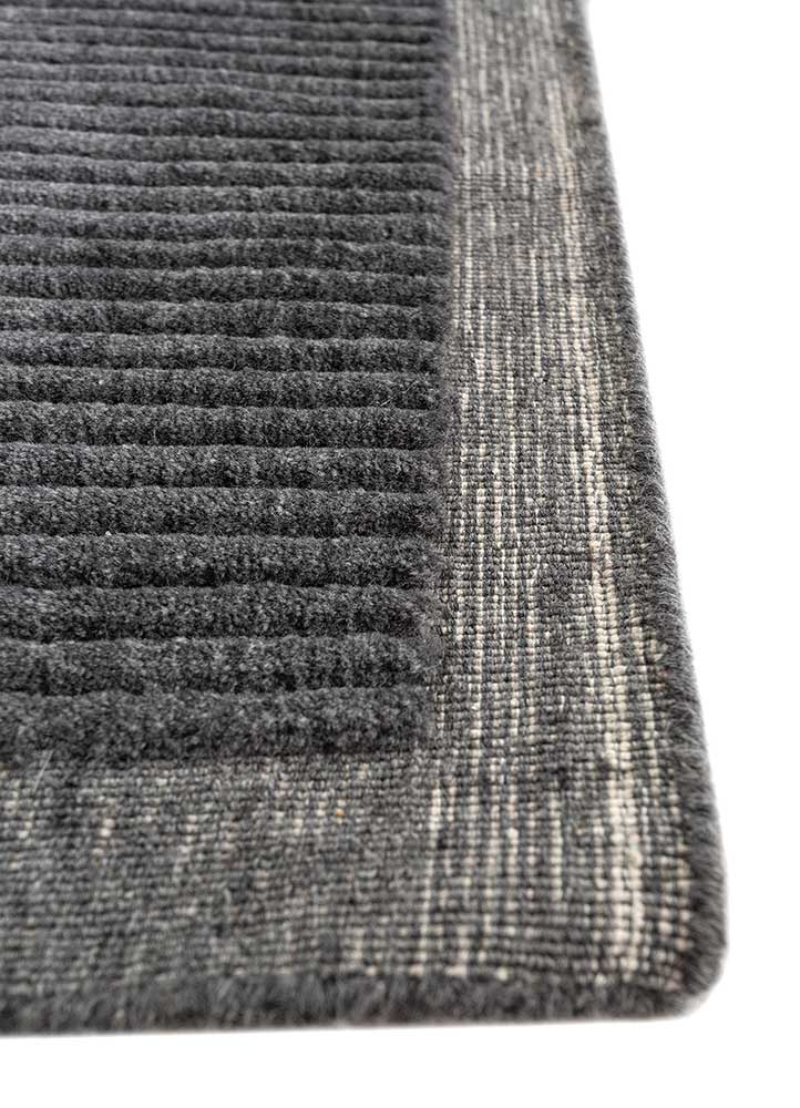 basis grey and black wool hand loom Rug - Corner