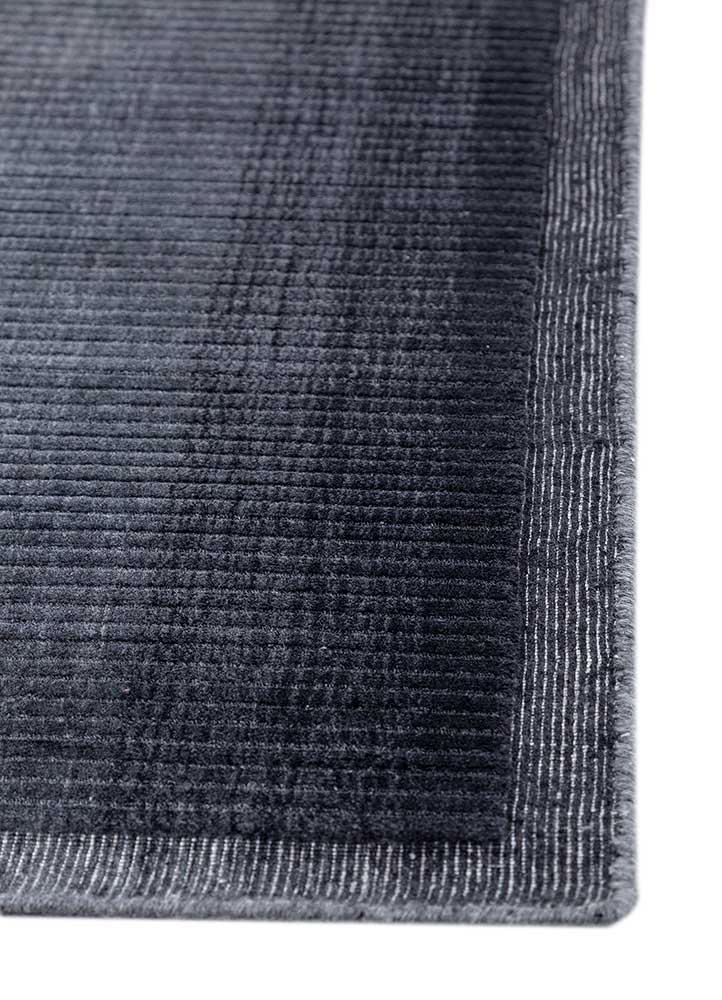 jean grey and black wool hand loom Rug - Corner
