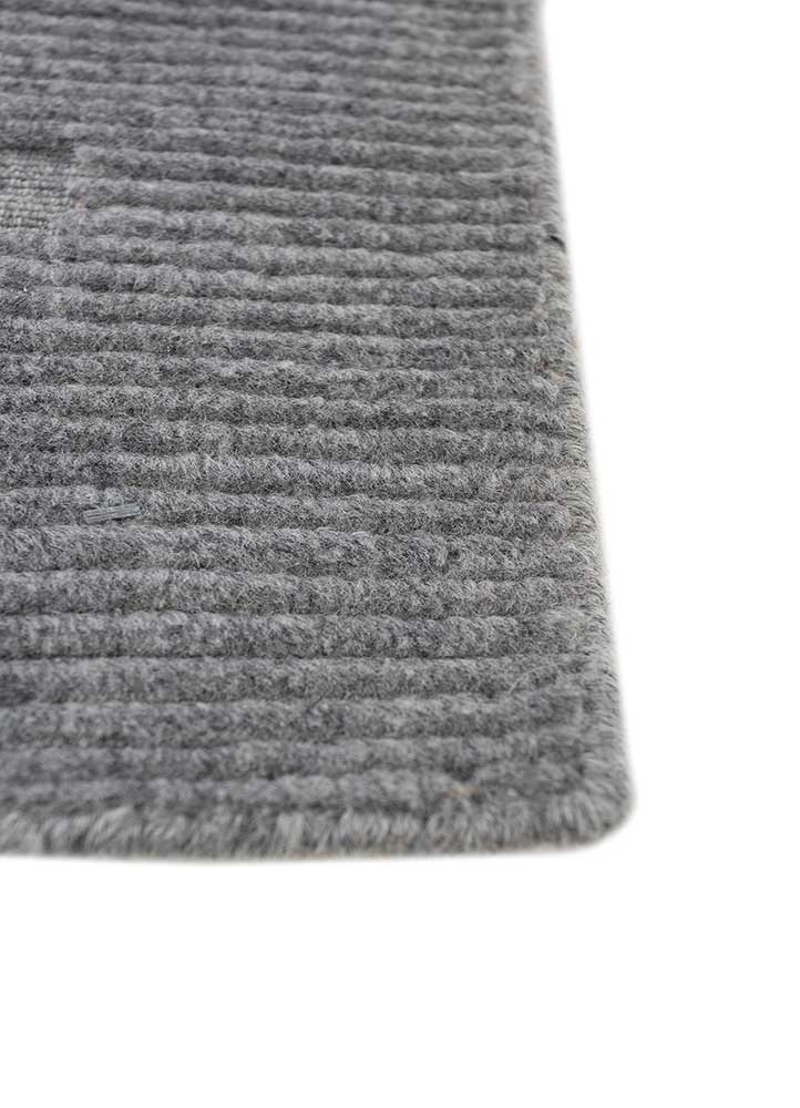basis grey and black wool hand loom Rug - Corner
