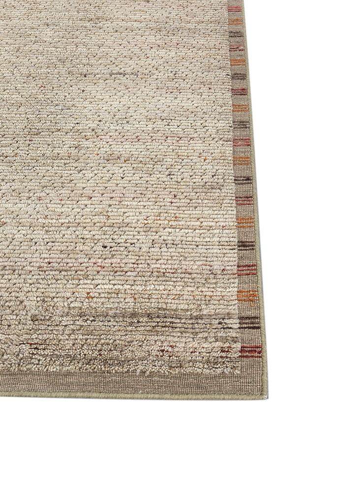 basis green wool hand loom Rug - Corner
