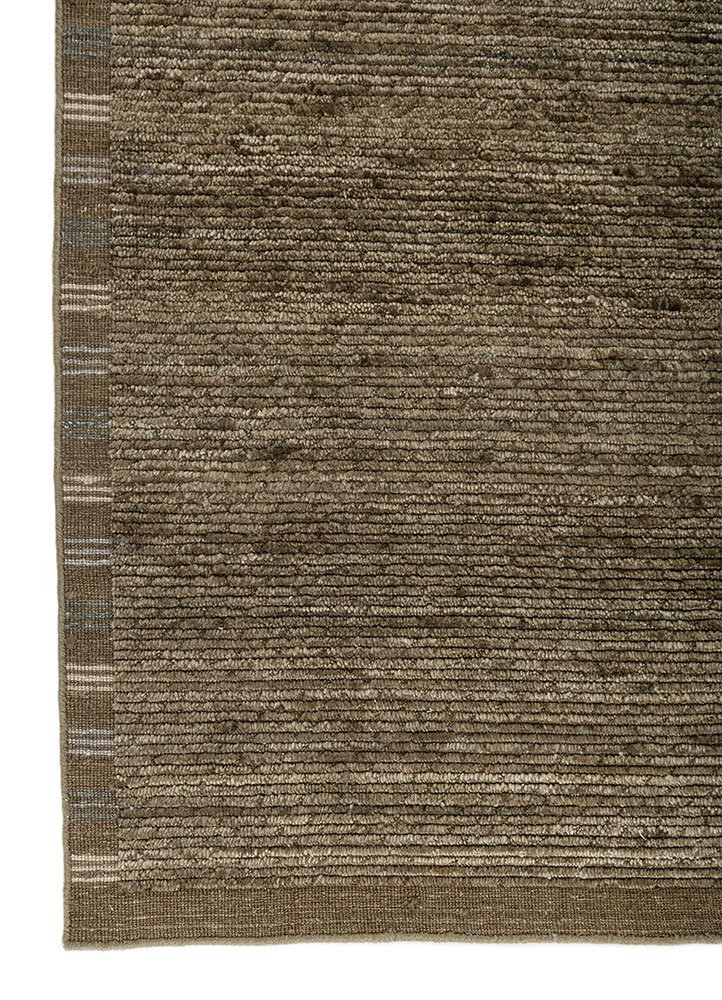 basis green wool hand loom Rug - Corner