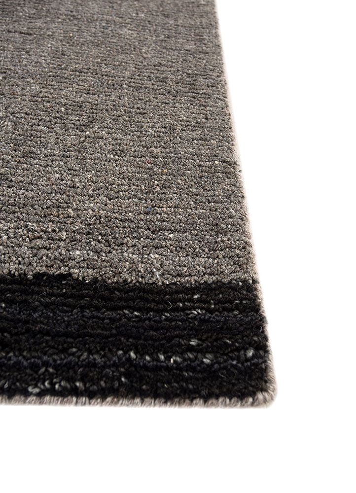 saga grey and black wool and viscose hand loom Rug - Corner
