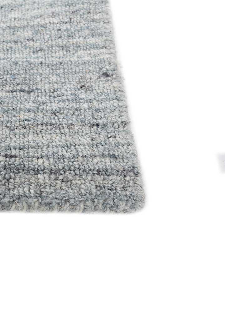 saga blue wool and viscose hand loom Rug - Corner