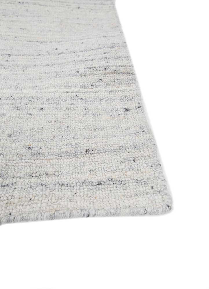 saga blue wool and viscose hand loom Rug - Corner