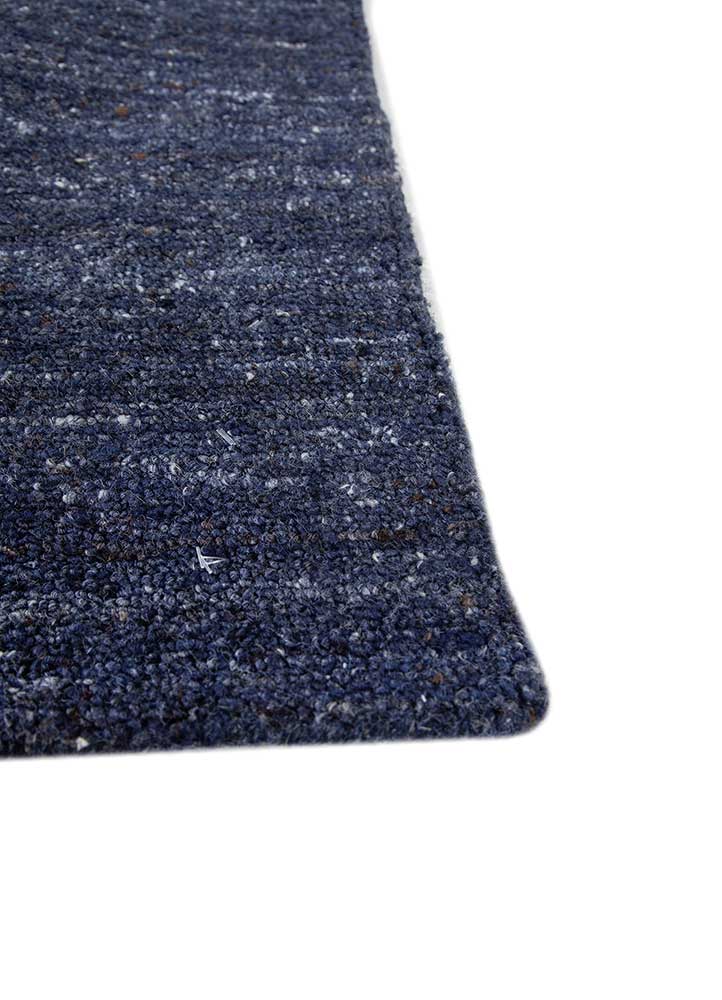 saga blue wool and viscose hand loom Rug - Corner