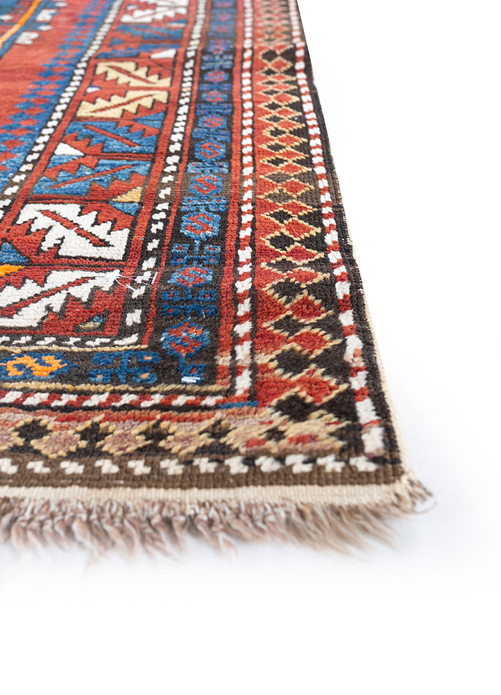 nuray red and orange wool hand knotted Rug - Corner