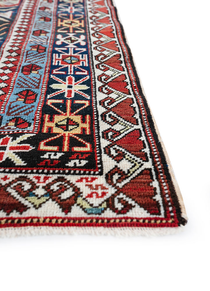 nuray red and orange wool hand knotted Rug - Corner
