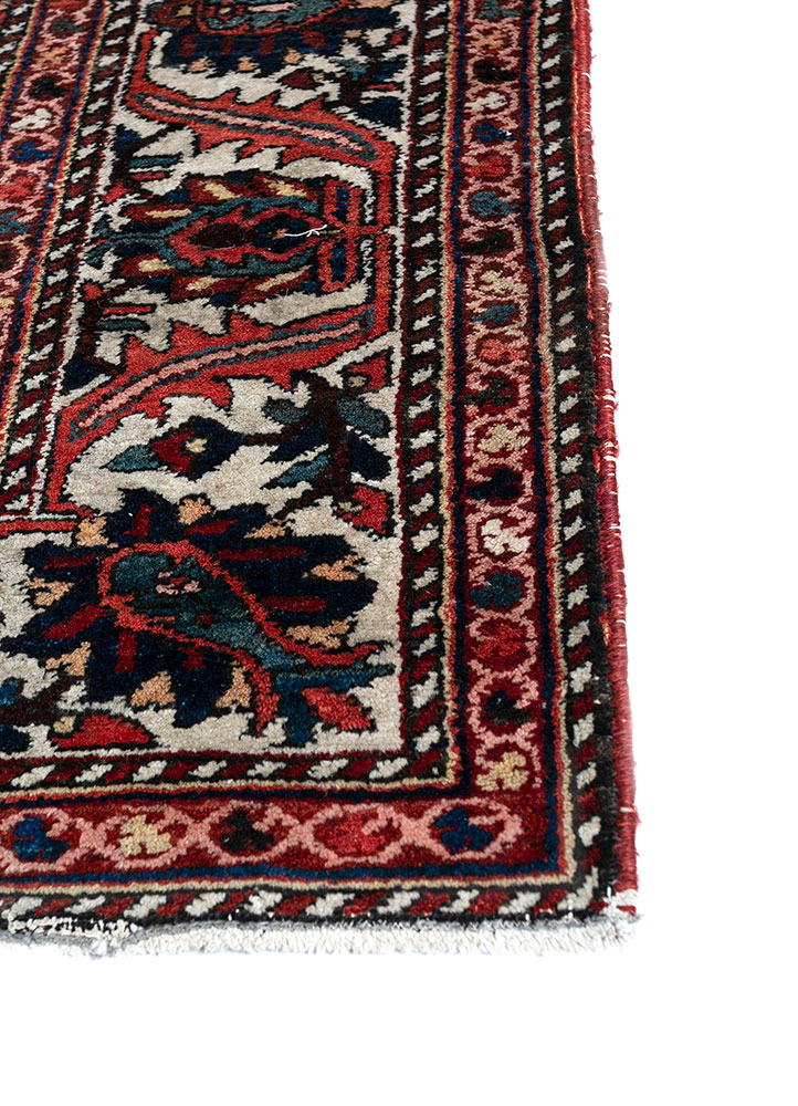 aalam red and orange wool hand knotted Rug - Corner
