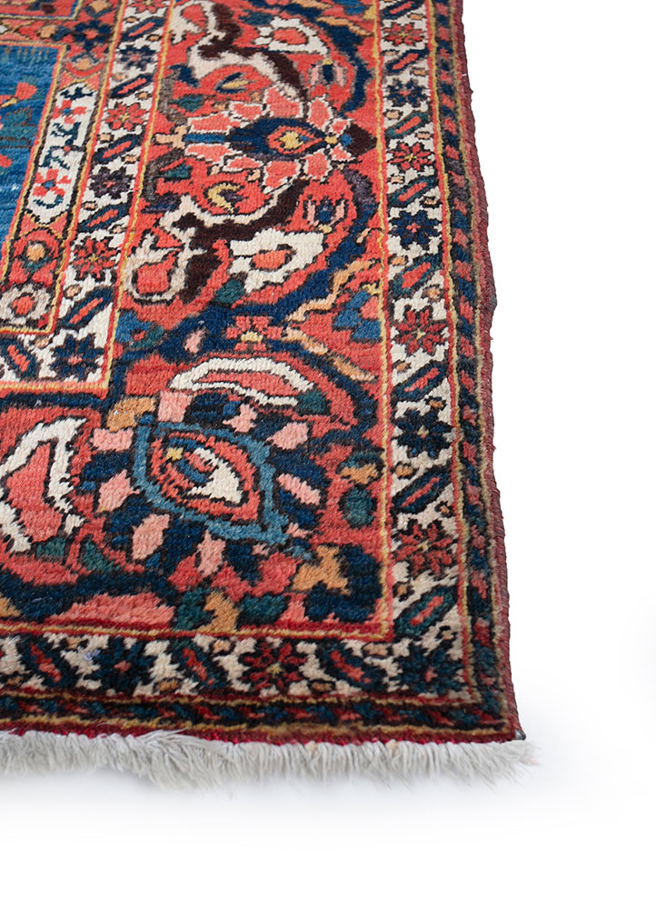 aalam red and orange wool hand knotted Rug - Corner