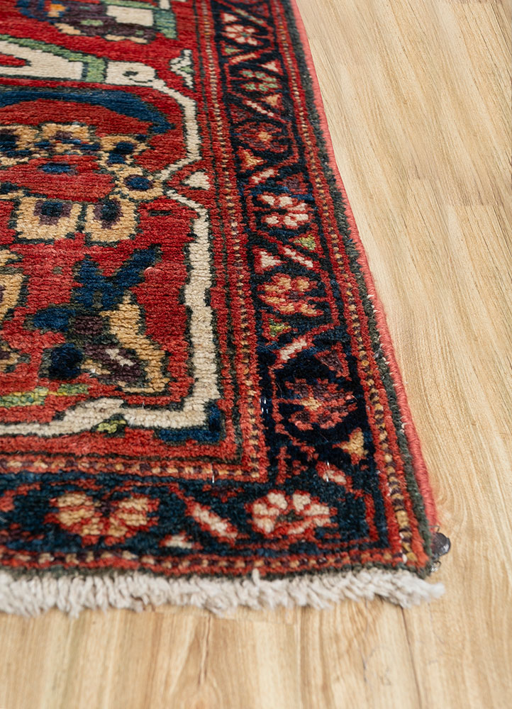 aalam red and orange wool hand knotted Rug - Corner
