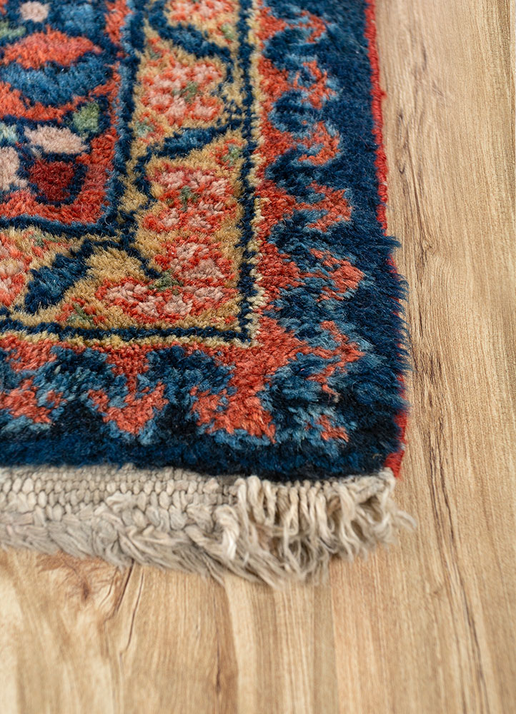 aalam red and orange wool hand knotted Rug - Corner