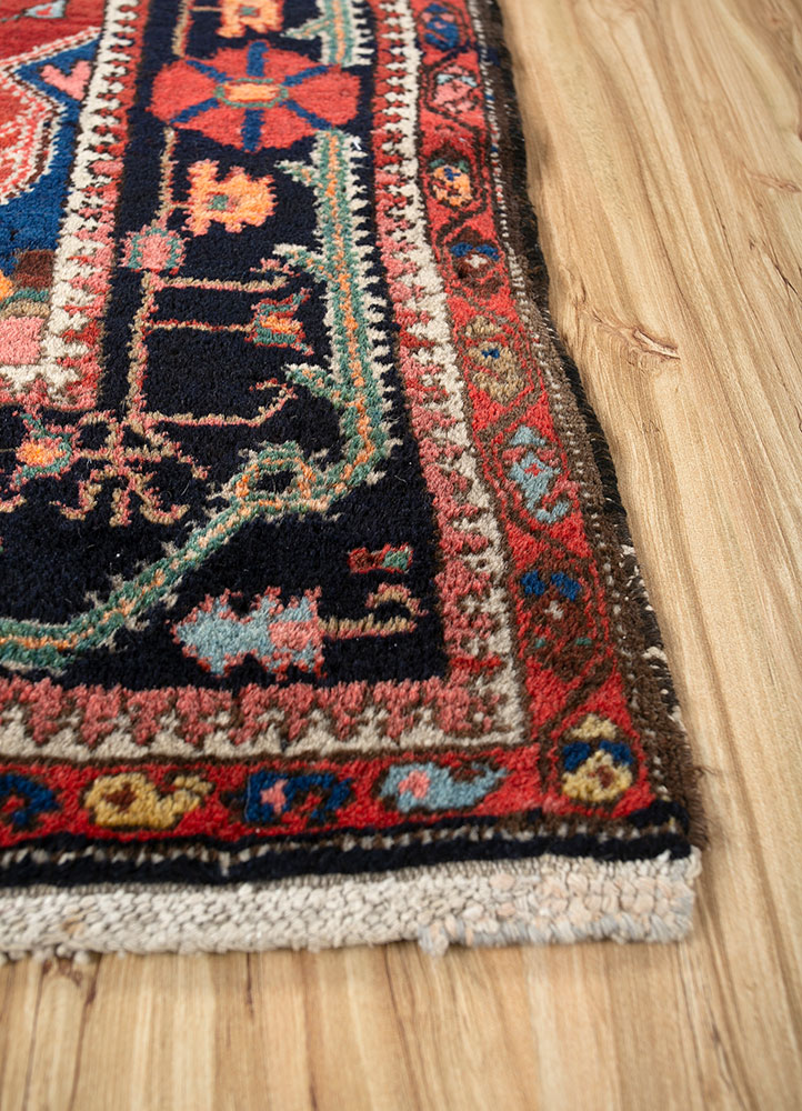 aalam red and orange wool hand knotted Rug - Corner