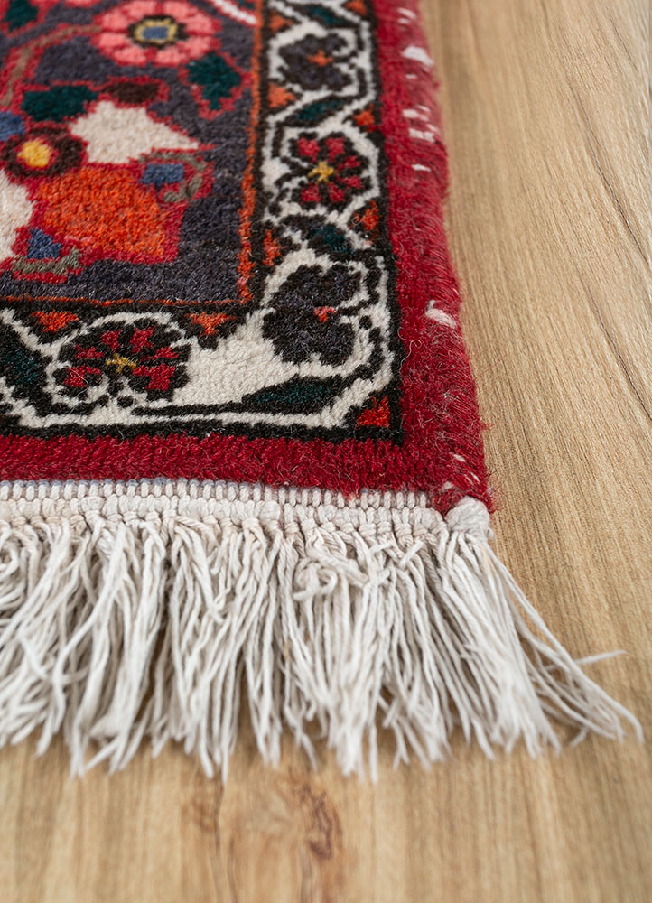 aalam red and orange wool hand knotted Rug - Corner