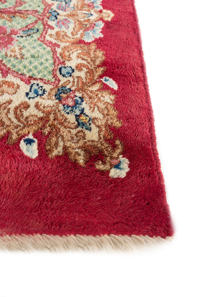 aalam red and orange wool hand knotted Rug - Corner