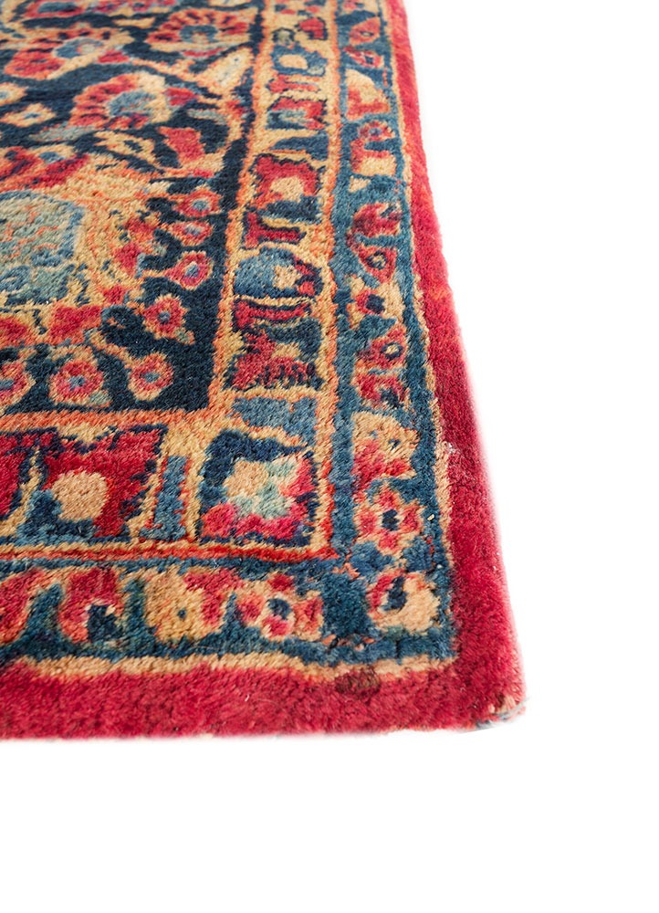 aalam red and orange wool hand knotted Rug - Corner