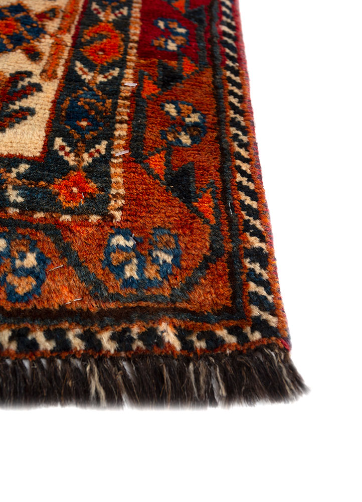 aalam red and orange wool hand knotted Rug - Corner