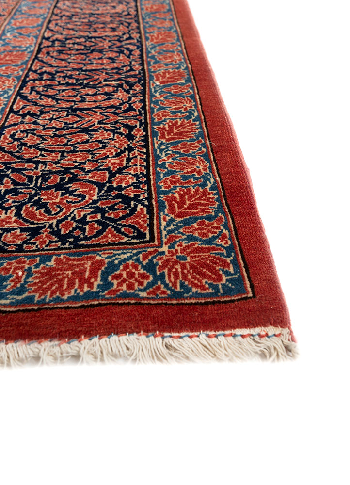aalam red and orange wool hand knotted Rug - Corner