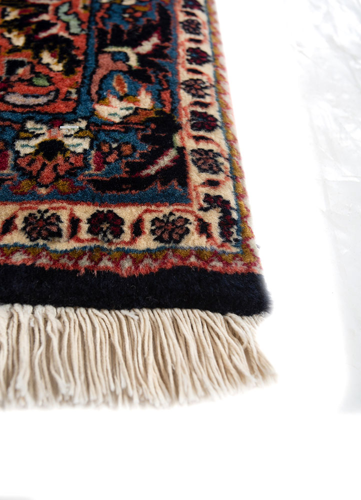aalam red and orange wool hand knotted Rug - Corner
