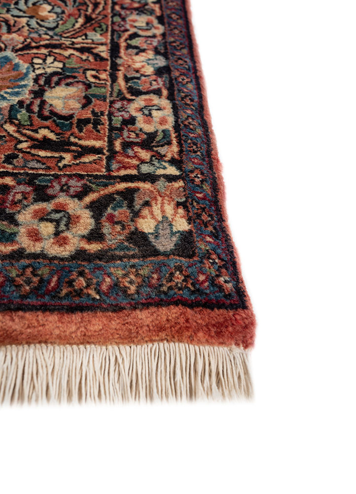 aalam red and orange wool hand knotted Rug - Corner