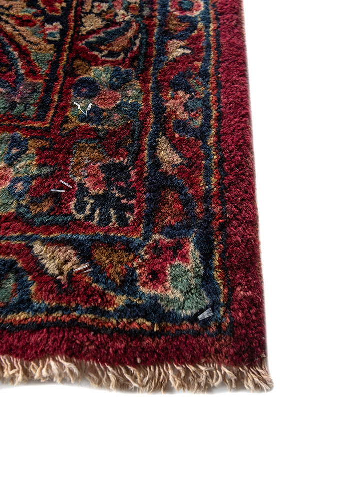 aalam red and orange wool hand knotted Rug - Corner