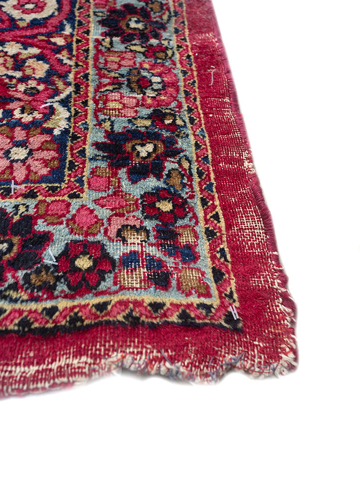 aalam red and orange wool hand knotted Rug - Corner