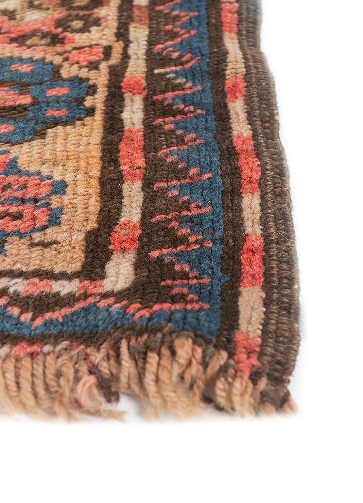 aalam red and orange wool hand knotted Rug - Corner