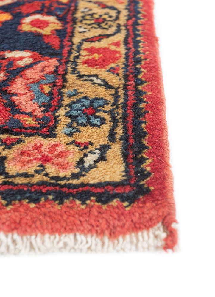 aalam red and orange wool hand knotted Rug - Corner