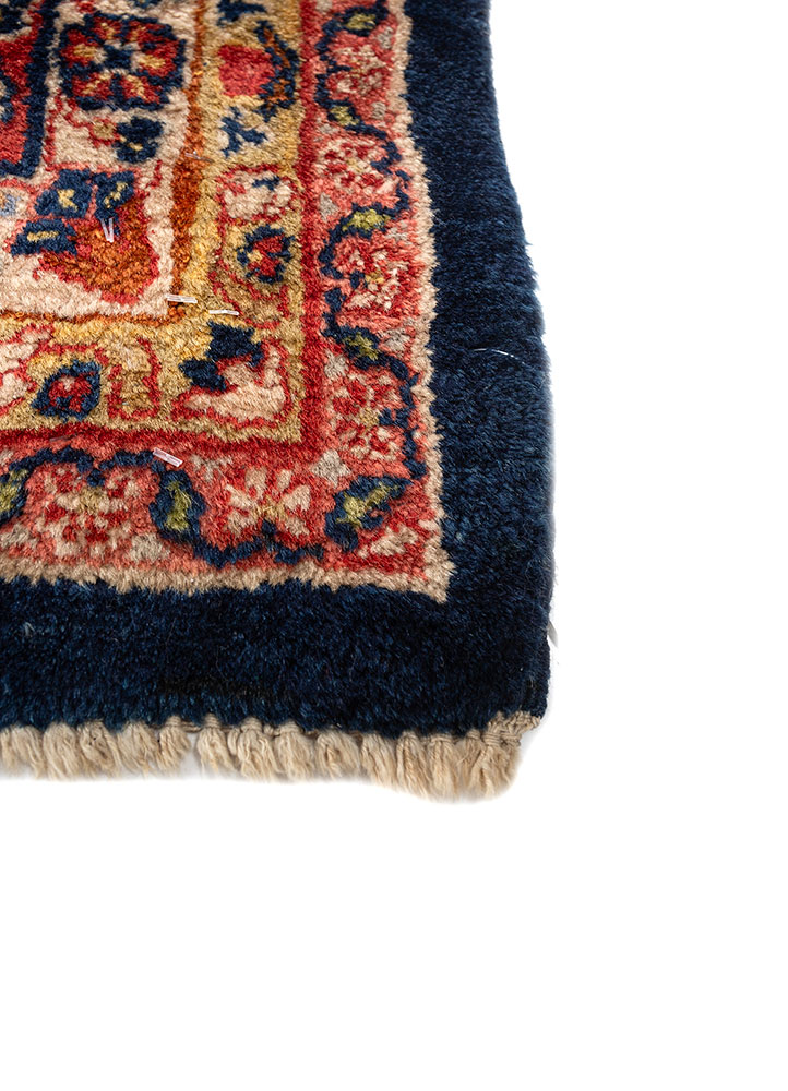 aalam red and orange wool hand knotted Rug - Corner
