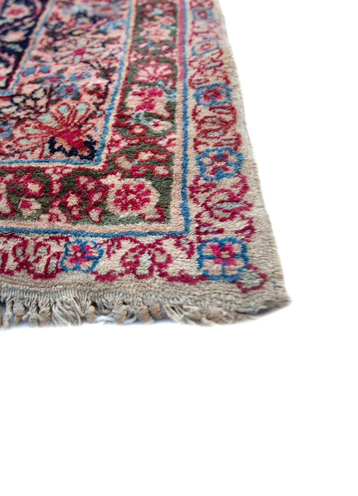 aalam red and orange wool hand knotted Rug - Corner