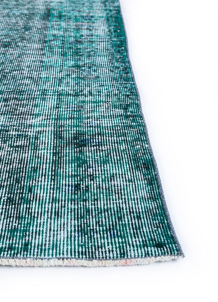 lacuna green wool hand knotted Rug - Corner
