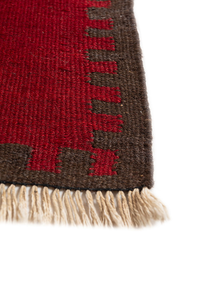 nayaab red and orange wool flat weaves Rug - Corner