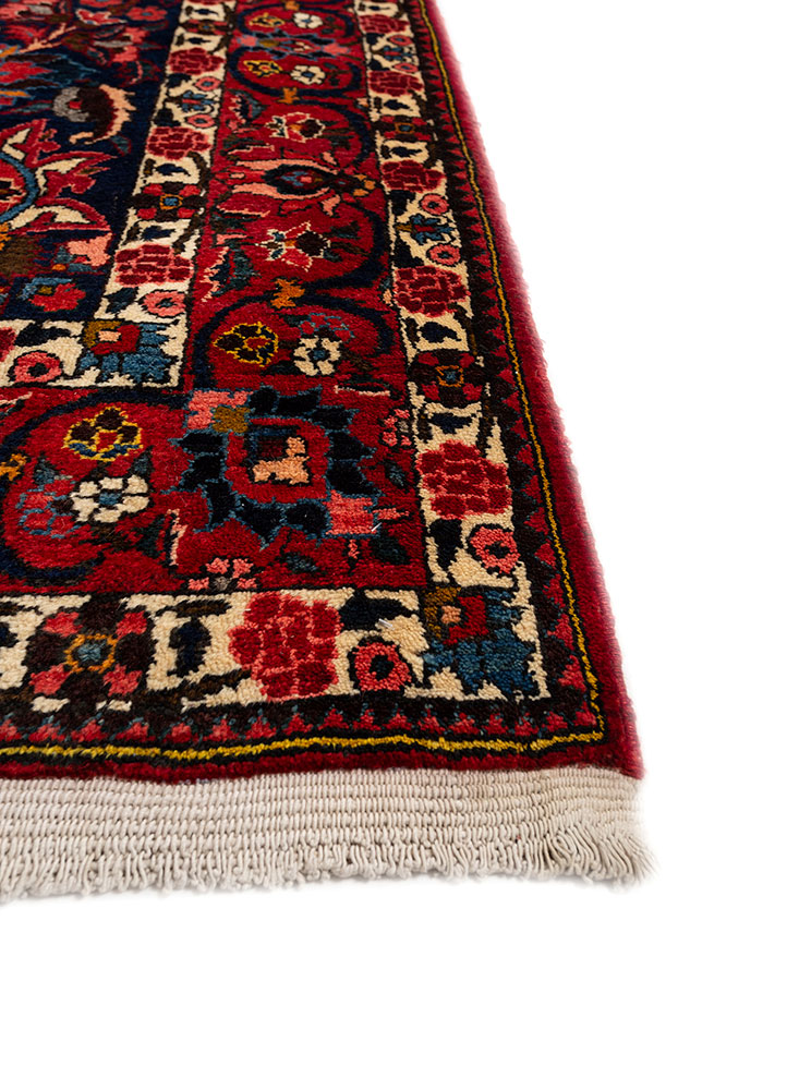 aalam red and orange wool hand knotted Rug - Corner