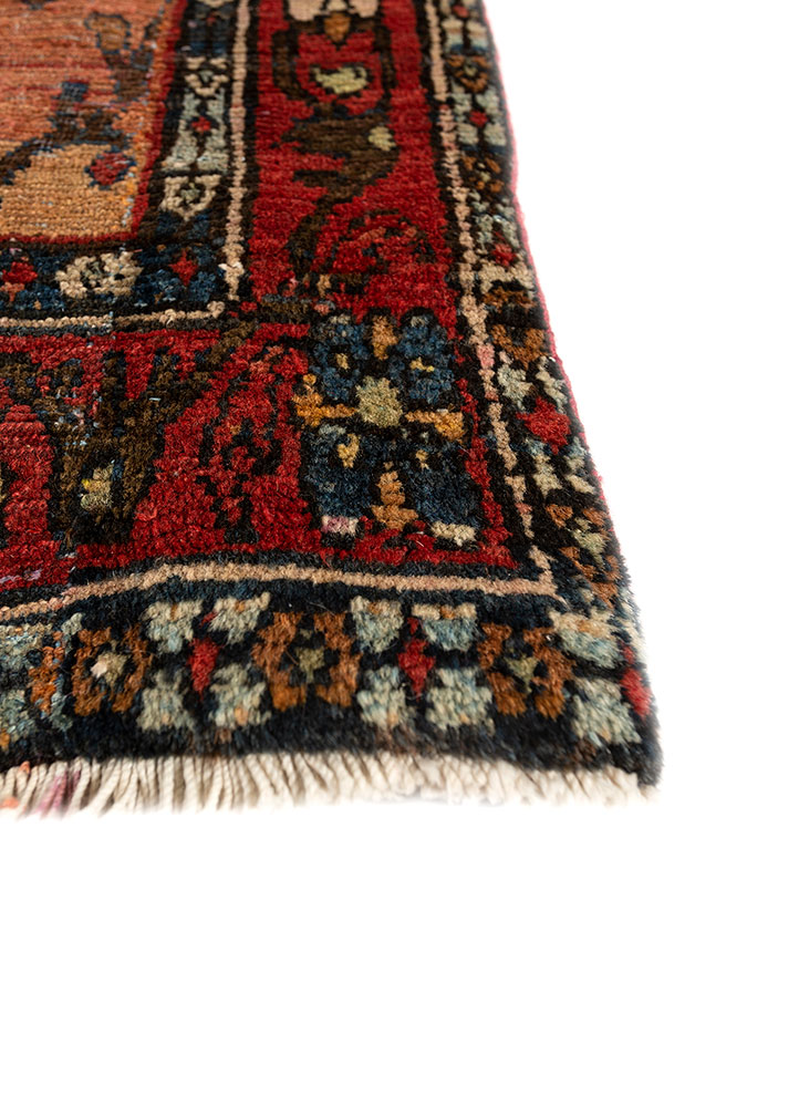 aalam red and orange wool hand knotted Rug - Corner