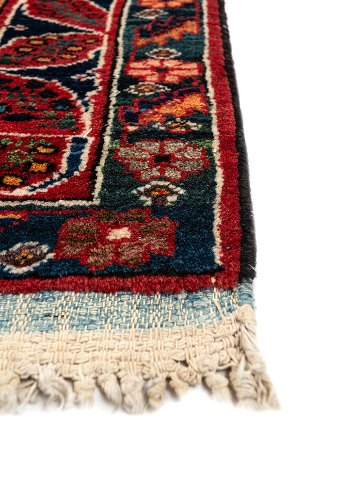 aalam red and orange wool hand knotted Rug - Corner