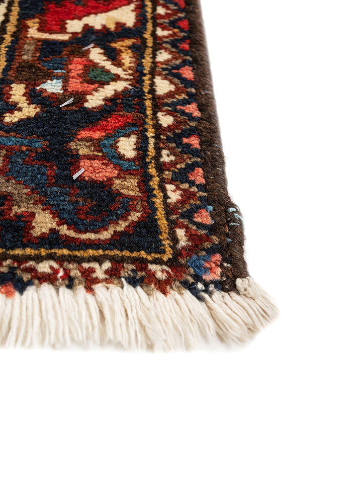 aalam red and orange wool hand knotted Rug - Corner