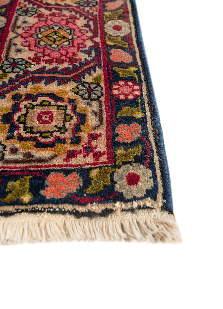aalam red and orange wool hand knotted Rug - Corner