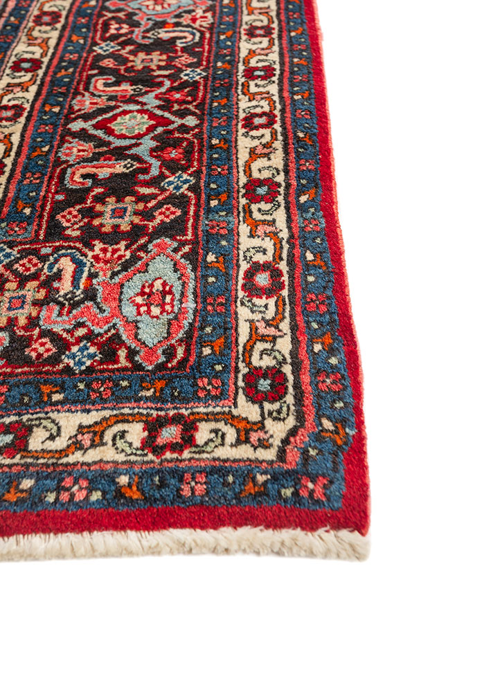 aalam red and orange wool hand knotted Rug - Corner