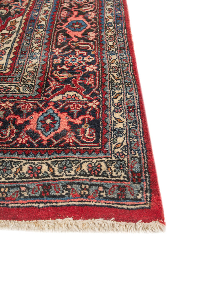 aalam red and orange wool hand knotted Rug - Corner