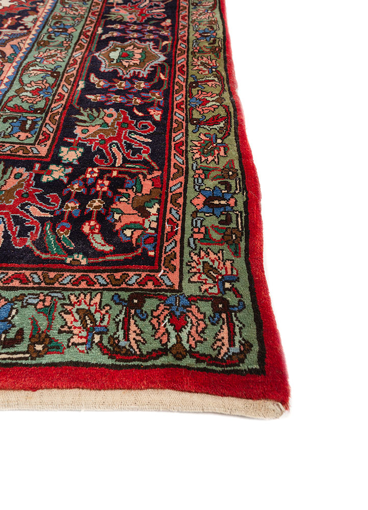 aalam red and orange wool hand knotted Rug - Corner
