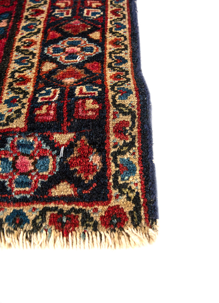 aalam red and orange wool hand knotted Rug - Corner