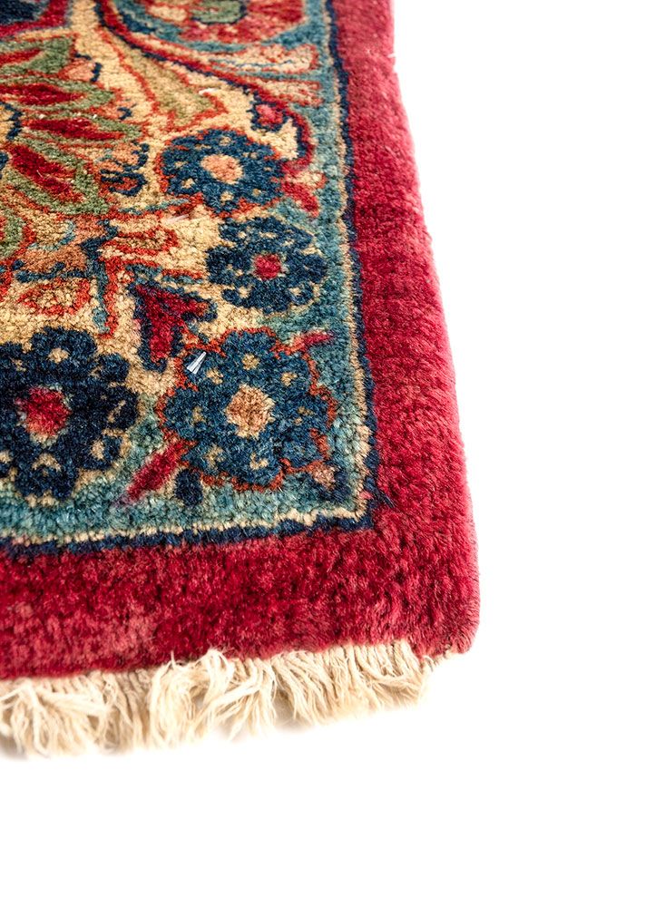 aalam red and orange wool hand knotted Rug - Corner