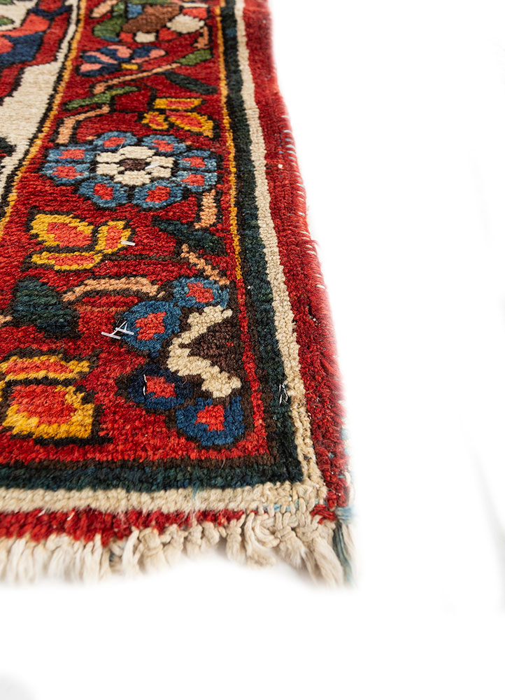aalam red and orange wool hand knotted Rug - Corner