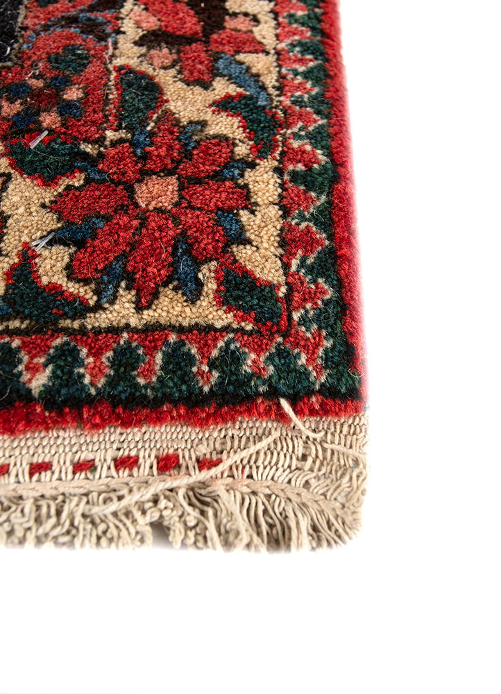 aalam red and orange wool hand knotted Rug - Corner