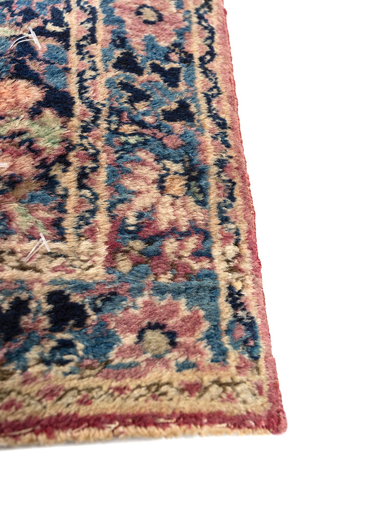 aalam red and orange wool hand knotted Rug - Corner