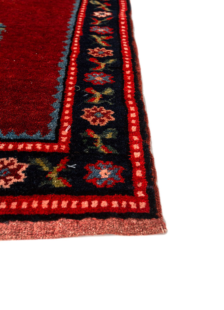 aalam red and orange wool hand knotted Rug - Corner