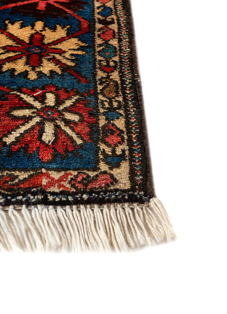 aalam red and orange wool hand knotted Rug - Corner