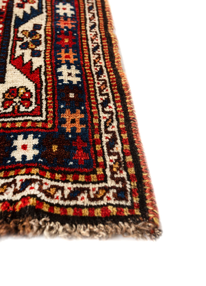 aalam red and orange wool hand knotted Rug - Corner