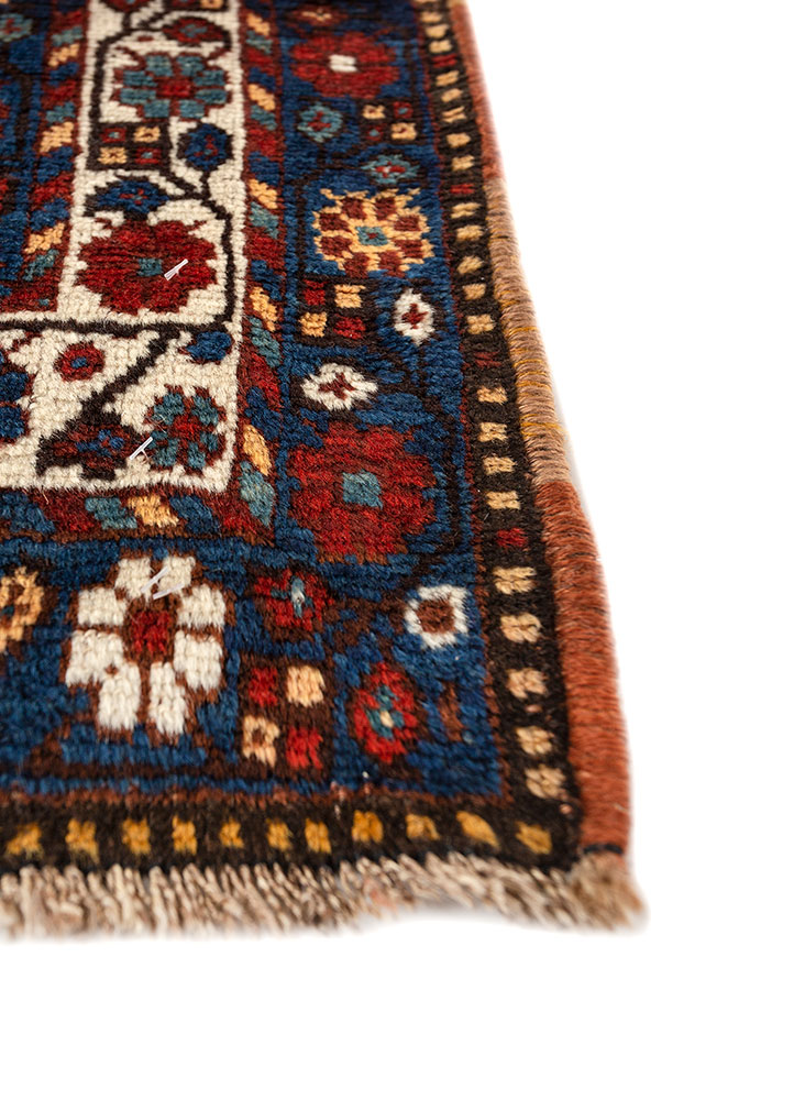 aalam red and orange wool hand knotted Rug - Corner